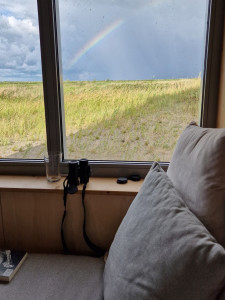 Uitzicht met regenboog vanuit Landal Marker Wadden vakantiehuis